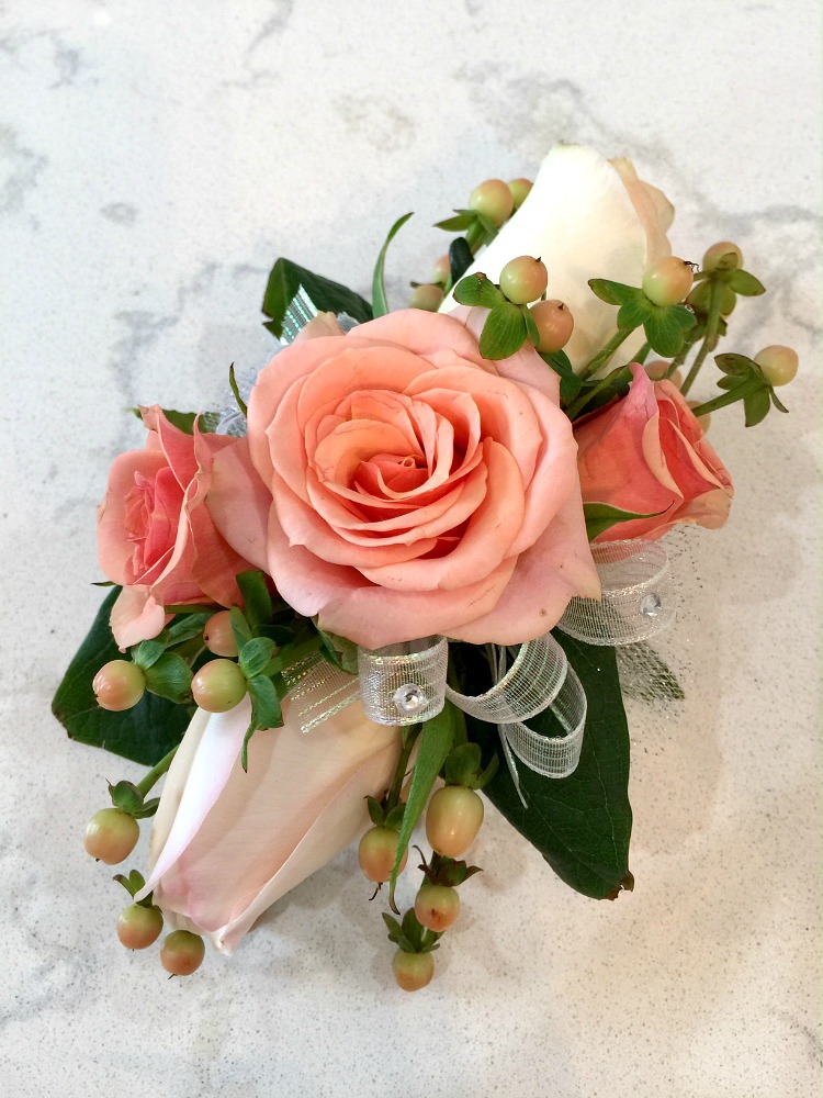making a wrist corsage with real flowers